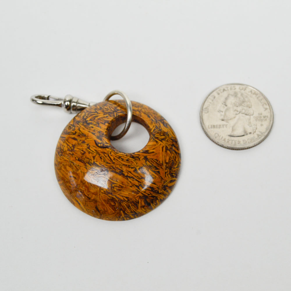 
                  
                    Serpent's Sable Charm
                  
                