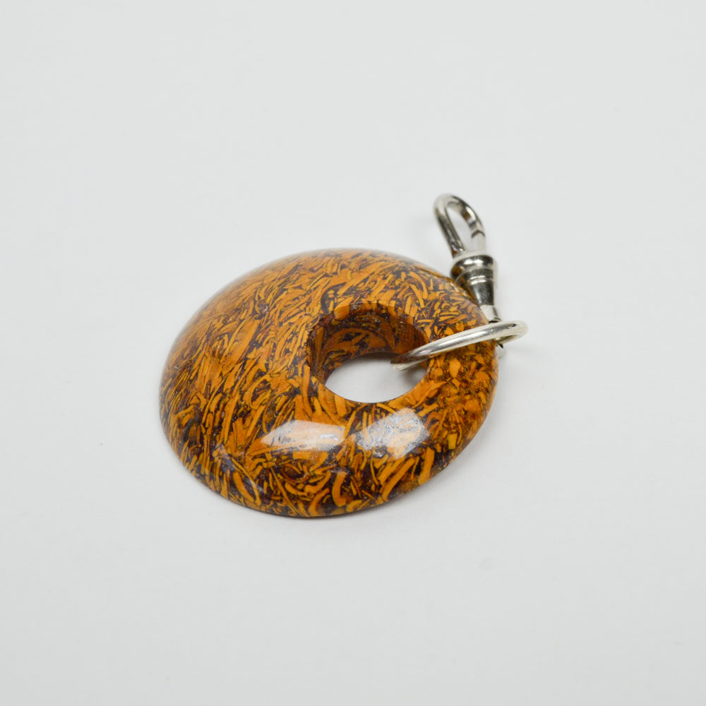 
                  
                    Serpent's Sable Charm
                  
                