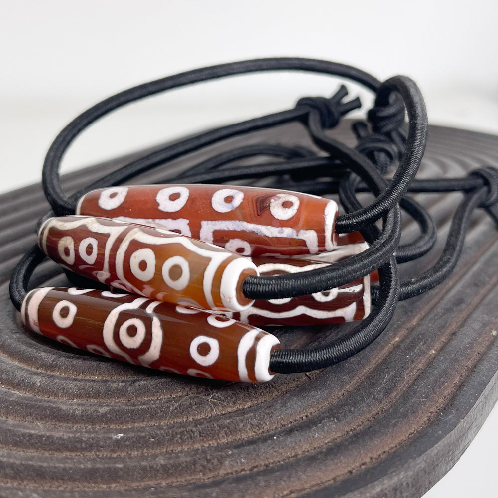 
                  
                    Cocoa Noir Hair Tie
                  
                